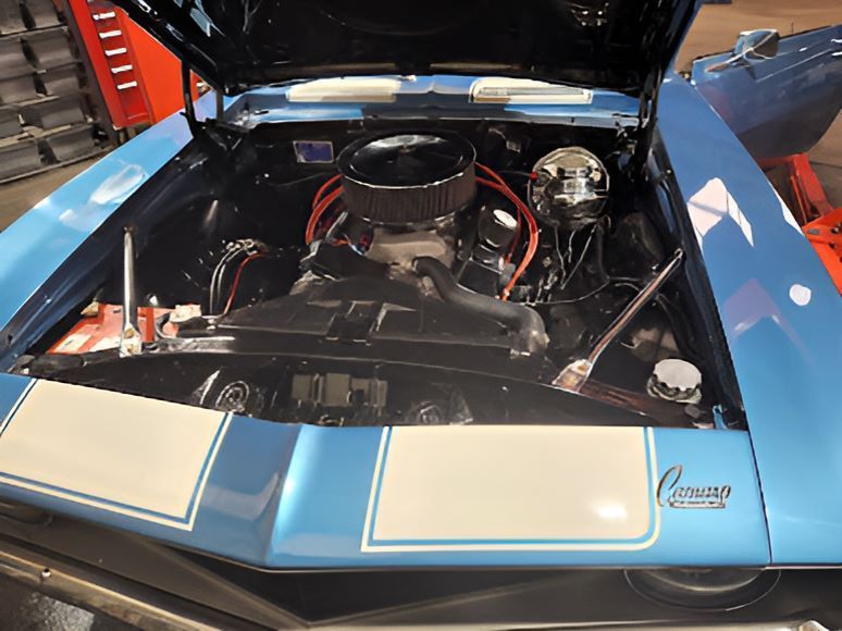 The Engine of a Blue Car With the Hood Open — Aitkenvale Auto & Dyno in Aitkenvale, QLD