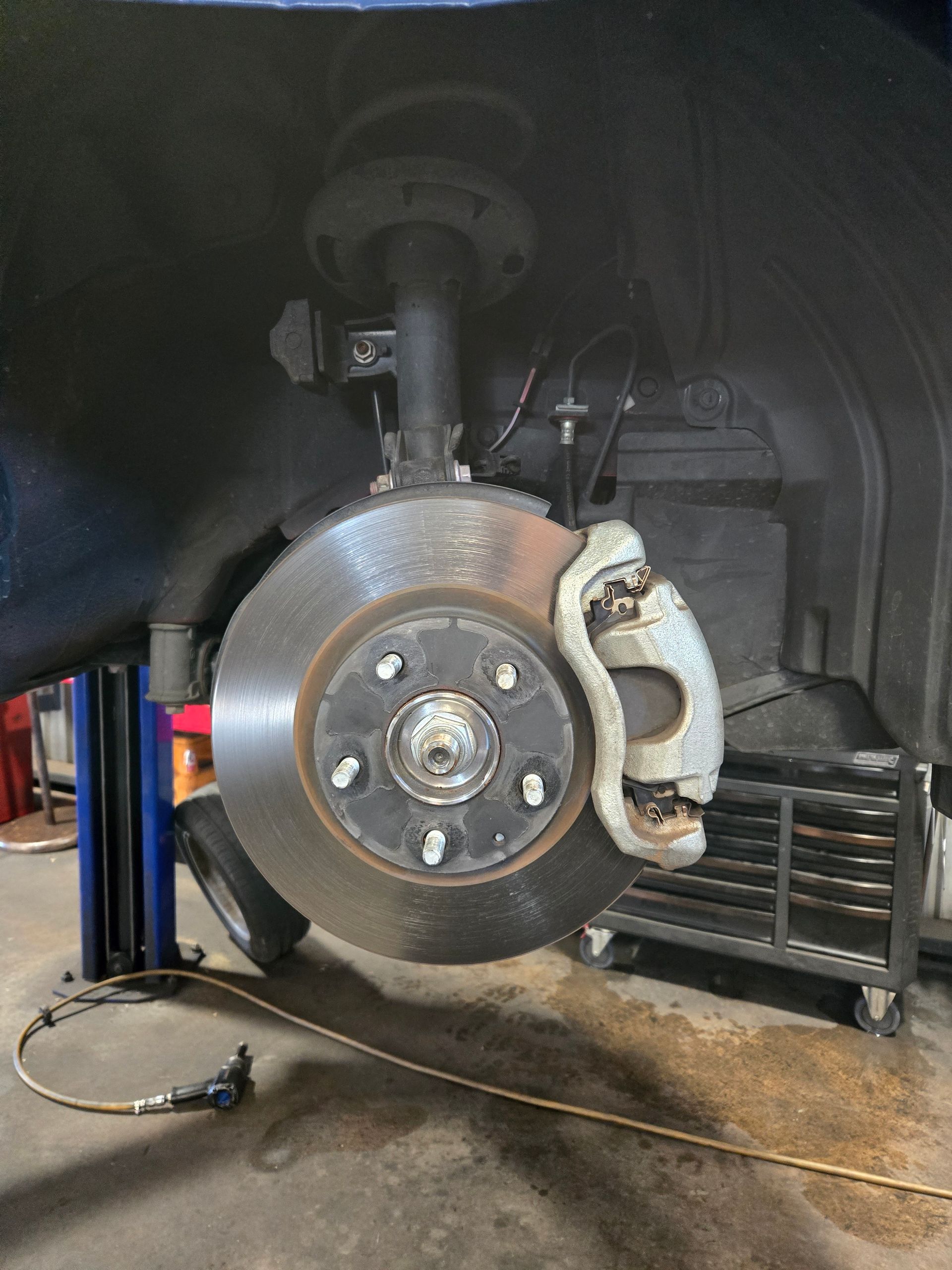 A Close Up of a Shock Absorber on a Car — Aitkenvale Auto & Dyno in Aitkenvale, QLD