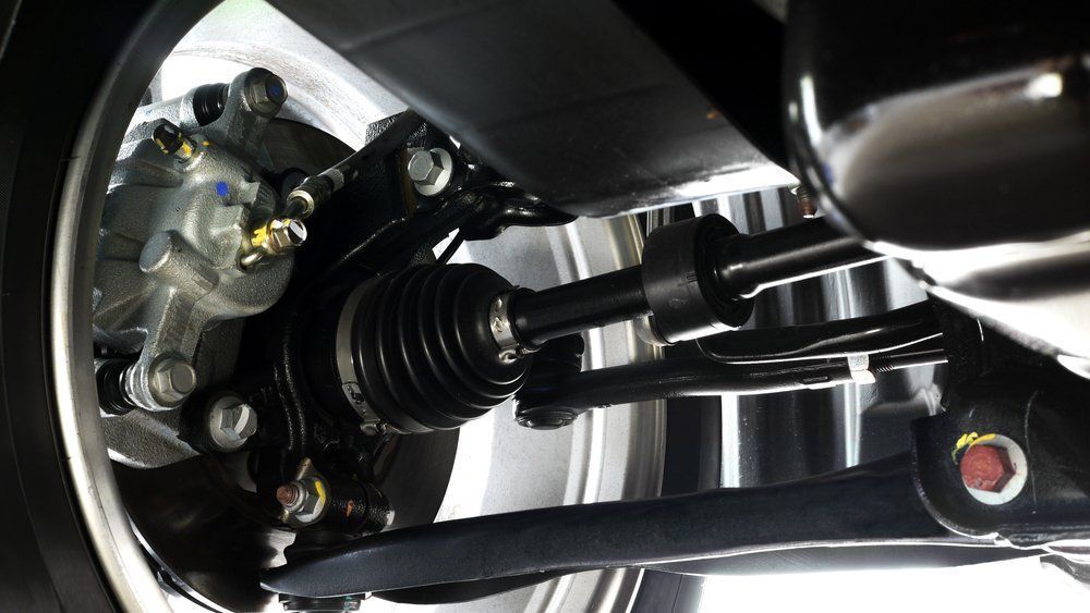 A Close Up of the Underside of a Car 's Suspension System — Aitkenvale Auto & Dyno in Aitkenvale, QLD
