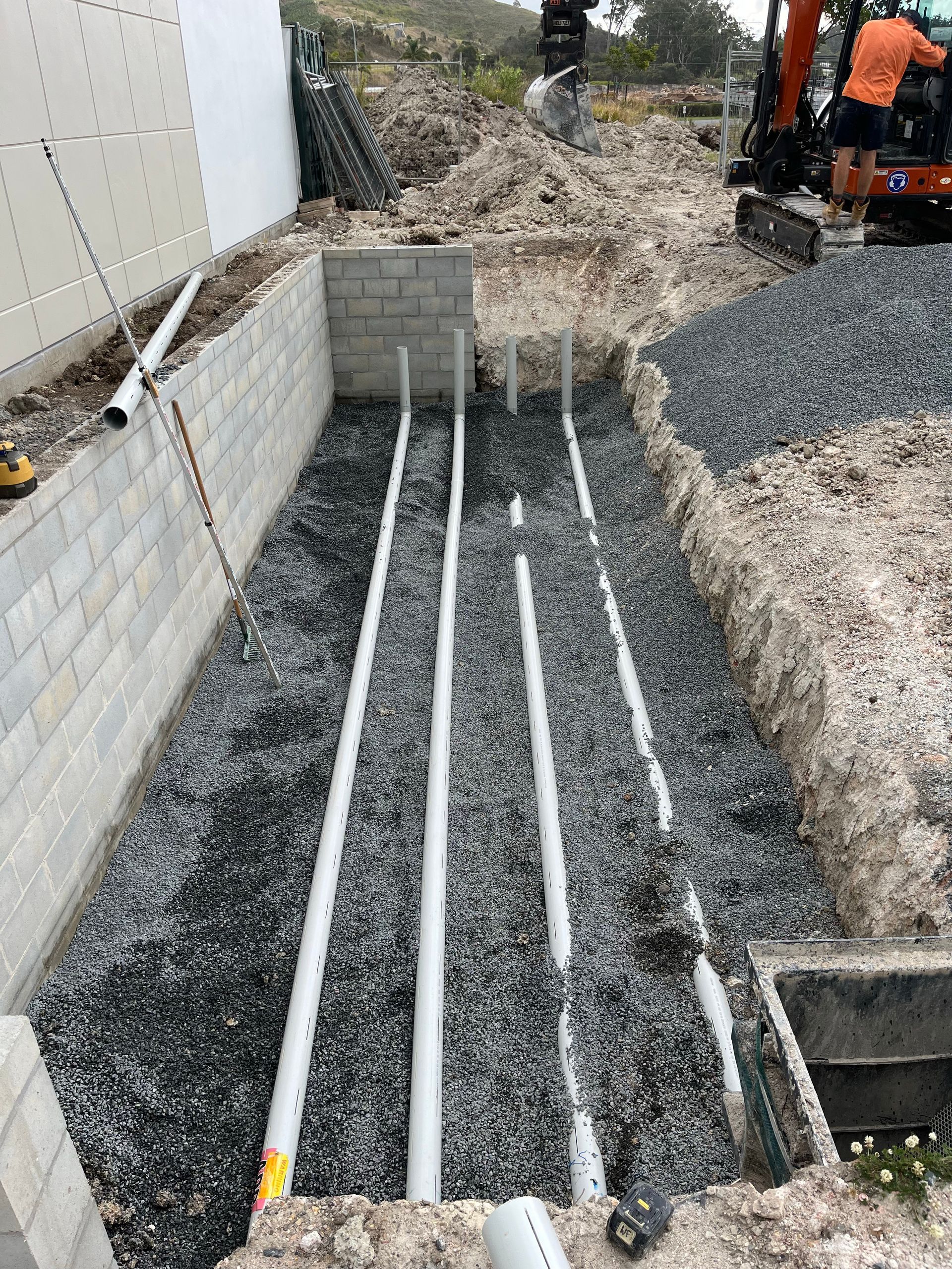 A Close Up Of A Rusty Pipe With A Hose Attached To It — Coastal Plumbing Group in Sawtell, NSW