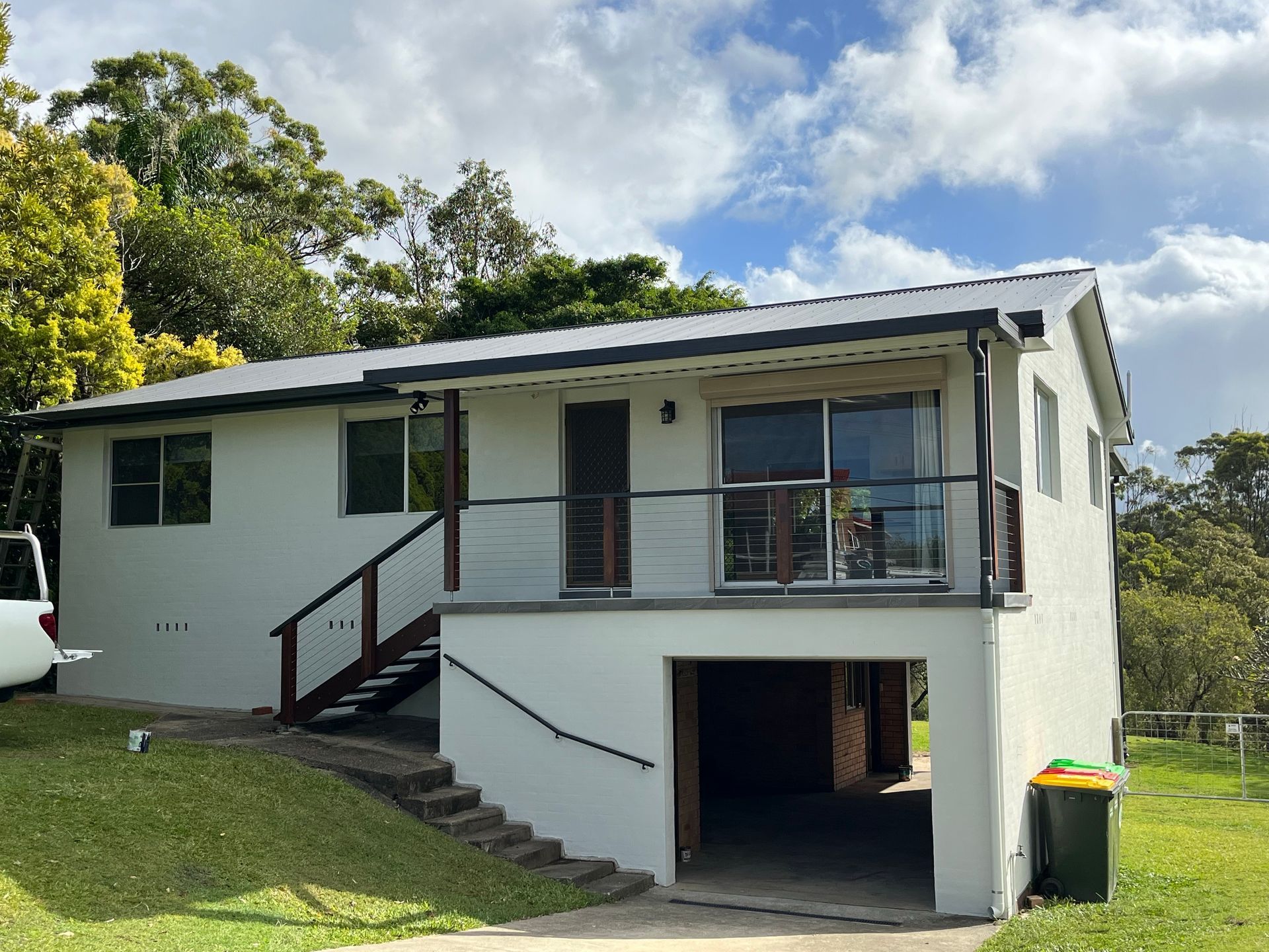 A Row Of Solar Panels Are Sitting On Top Of A Roof — Roof Repairs Coffs Harbour - Coastal Plumbing Group in Woolgoolga, NSW