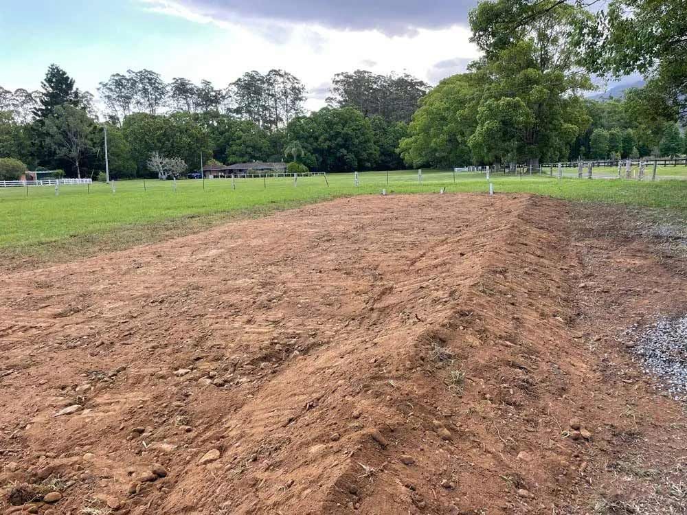 There Is A Lot Of Dirt In The Middle Of A Field — Coastal Plumbing Group in Woolgoolga, NSW
