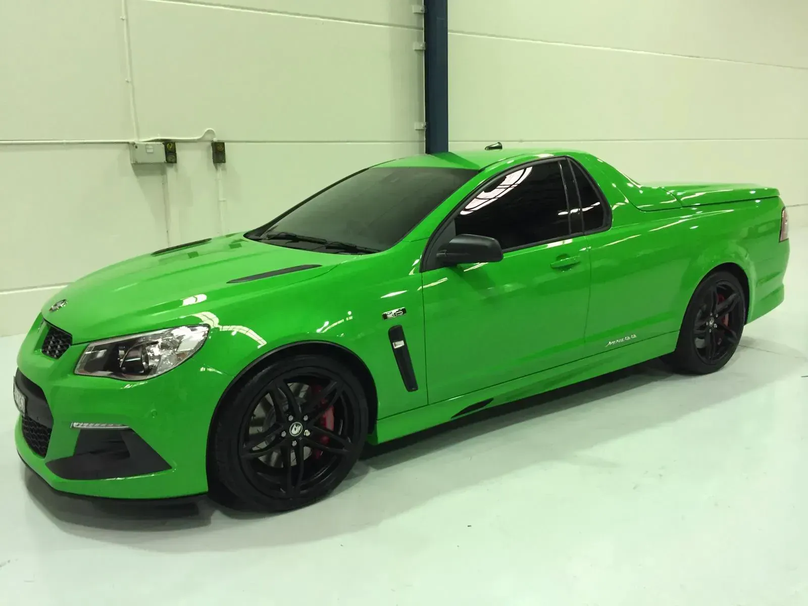 A green ute with a ceramic film tint.