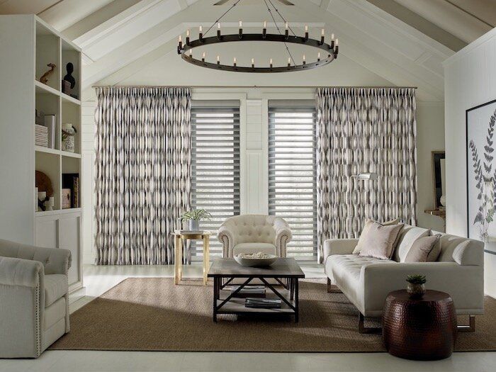 living room with curtain and sheer shades