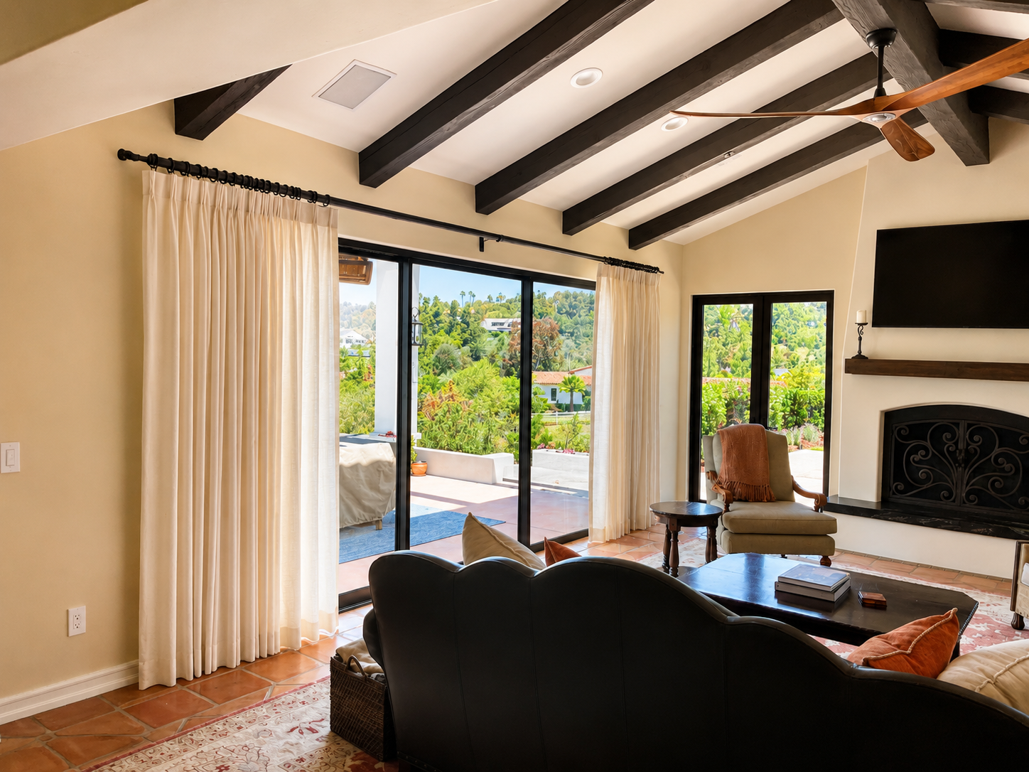 Inverted pleat draperies in Spanish Modern living room  in Del Mar CA