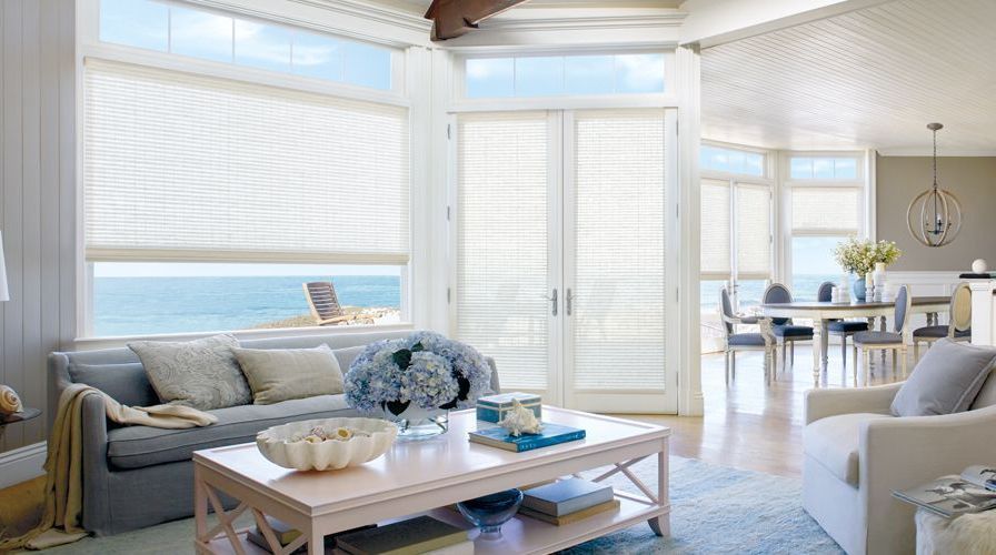 Provenance®Woven Wood Shades in living room offered by window spaces in Carlsbad, ca