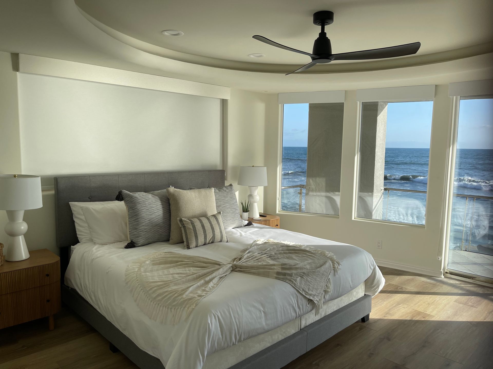 Oceanside, Ca Bedroom with bed, ocean view windows, and blackout roller shades