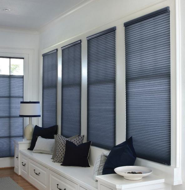 Blue Honeycomb Shades in dining area windows