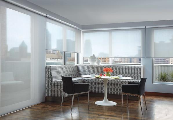 White Solar Shades in dining area windows
