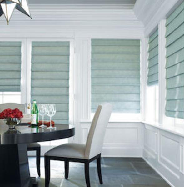 Green Roman Shades in dining room