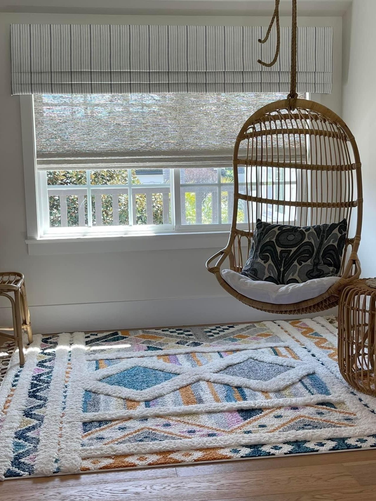 White Natural Woven Shades and custom valance in Encinitas California home.