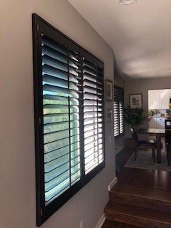 Window Spaces installed stained Wood Shutters in Oceanside, CA