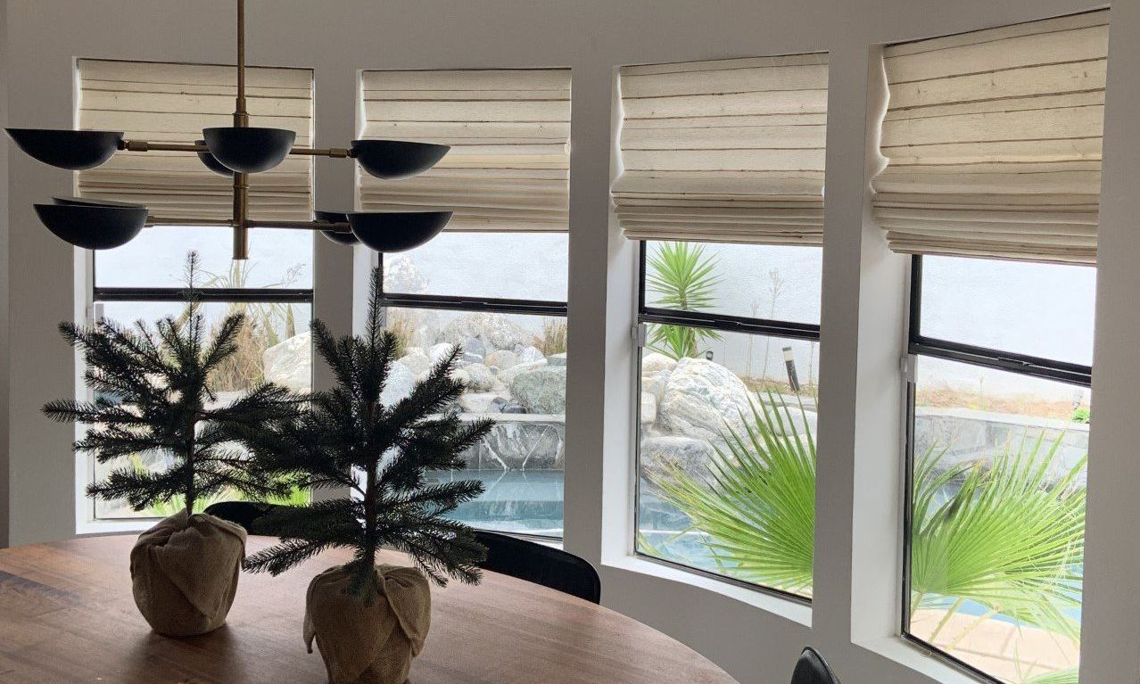 Woven Window Shades in the dining room windows in Encinitas, CA home.