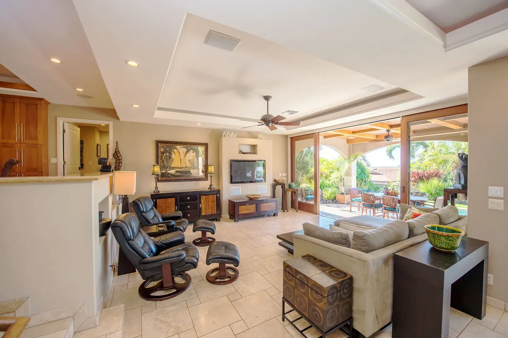 A living room filled with furniture and a flat screen tv