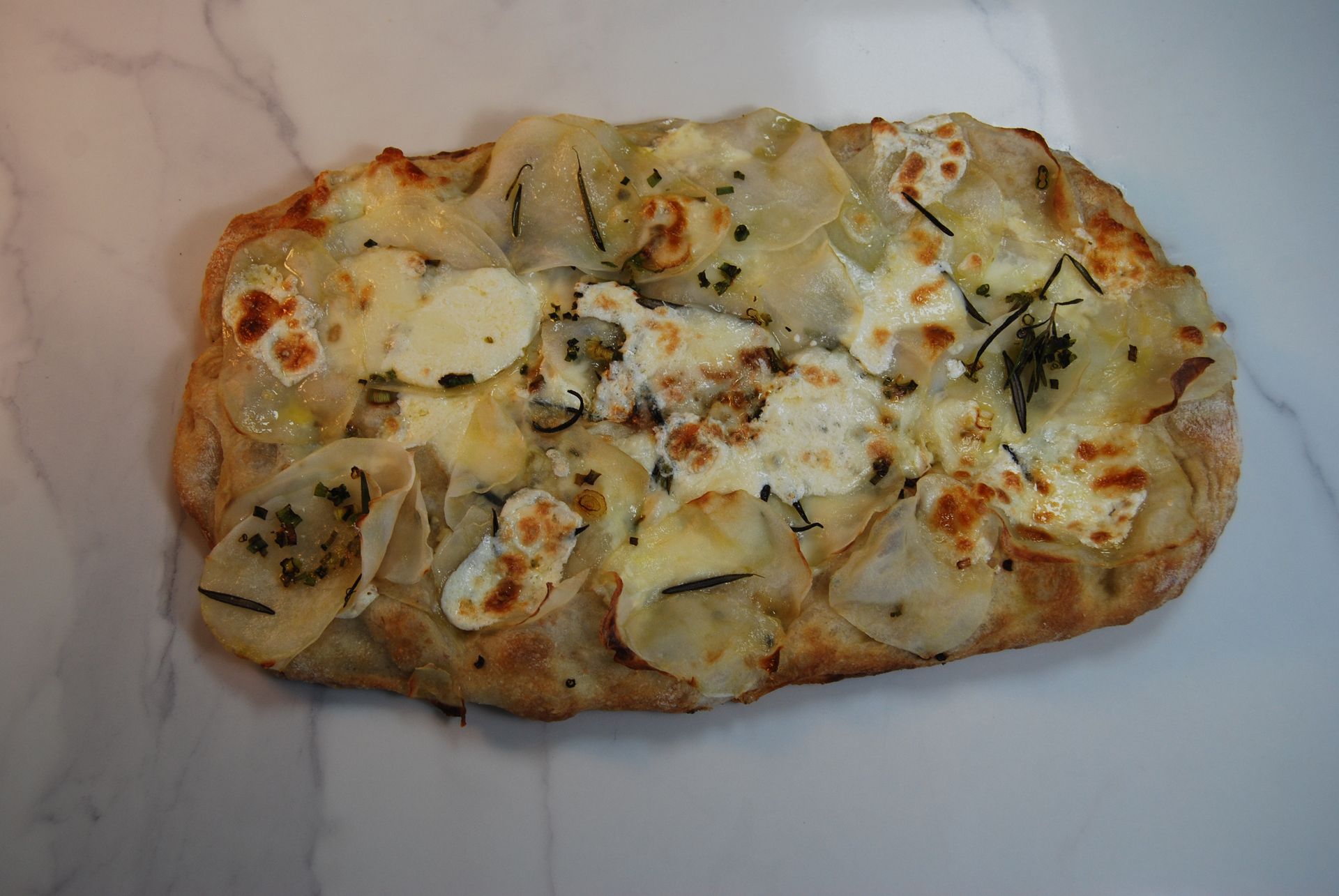 A pizza with a lot of cheese on it