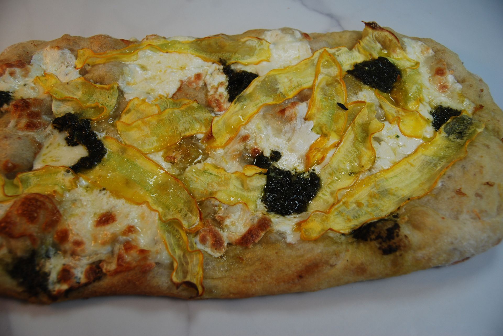 A pizza with a lot of toppings on it