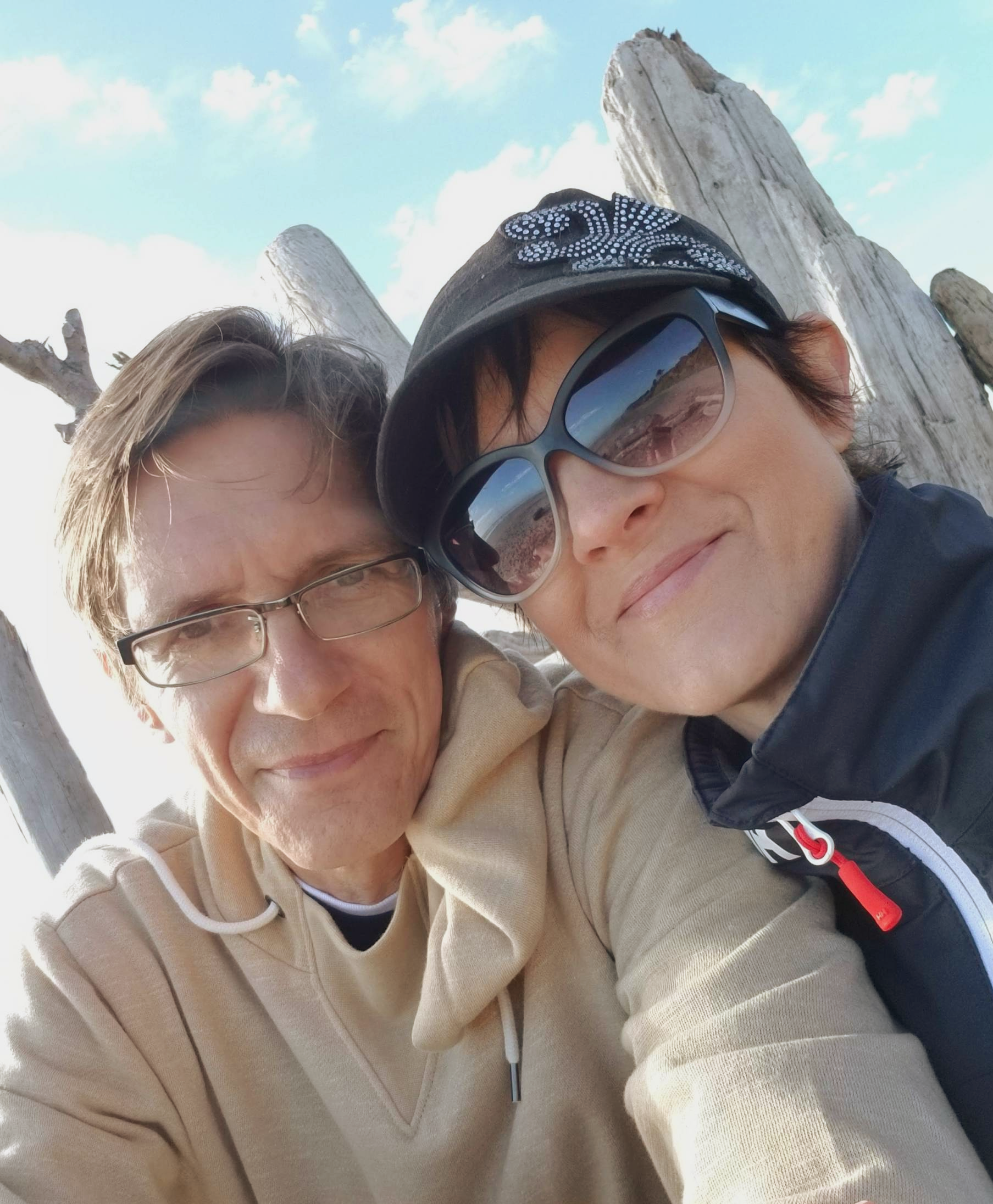 A man and a woman are posing for a picture together