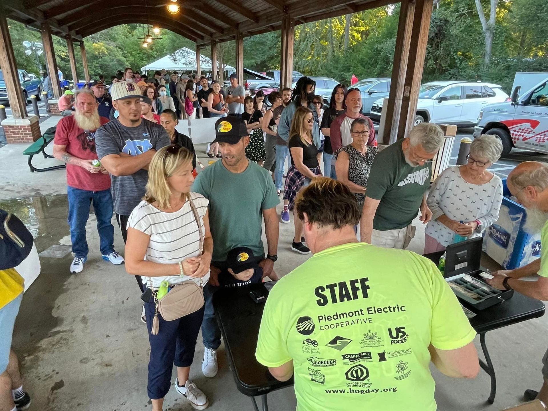 Crowd of people looking at vendor stalls