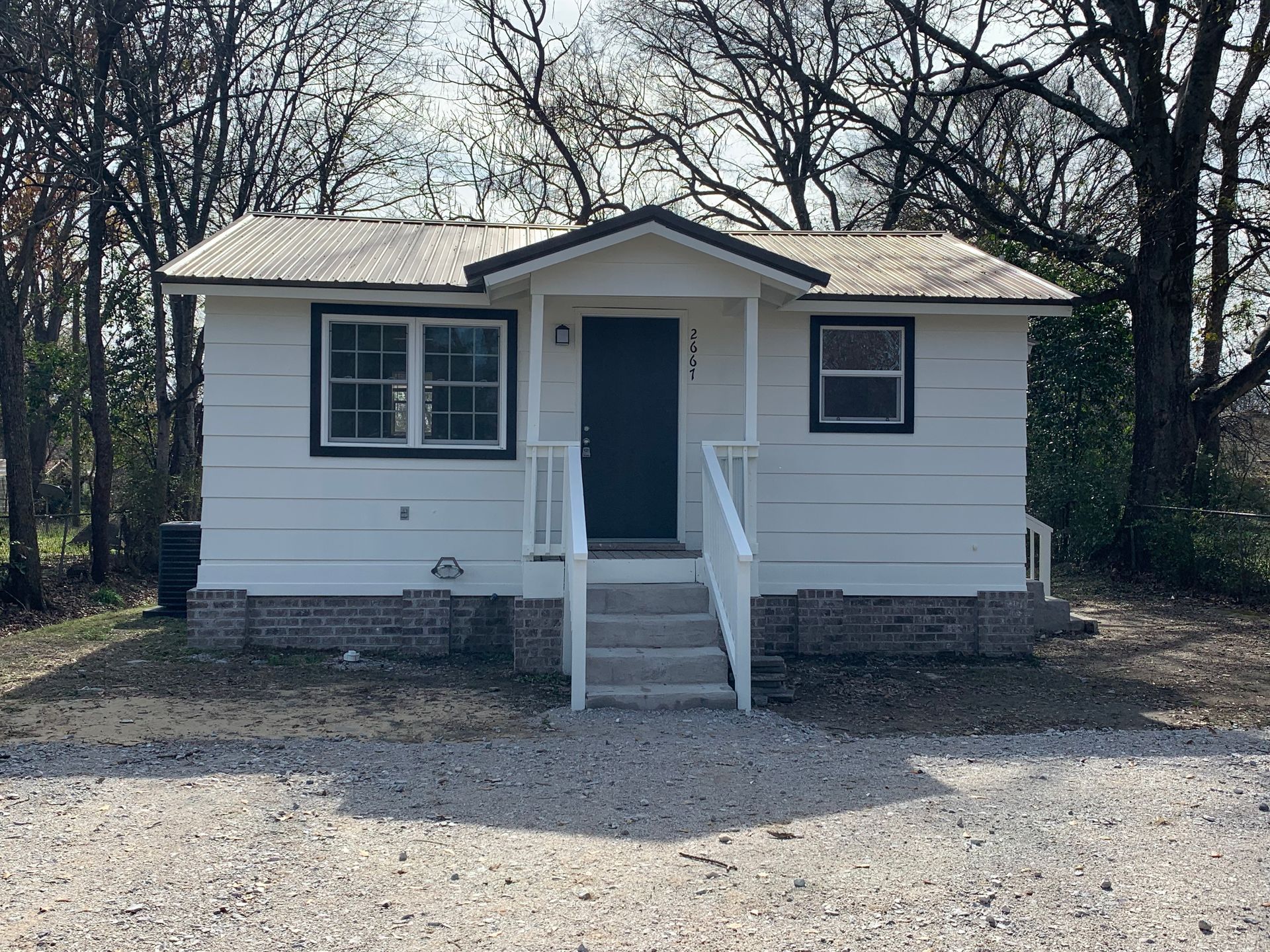 White single-family home for with a stair case