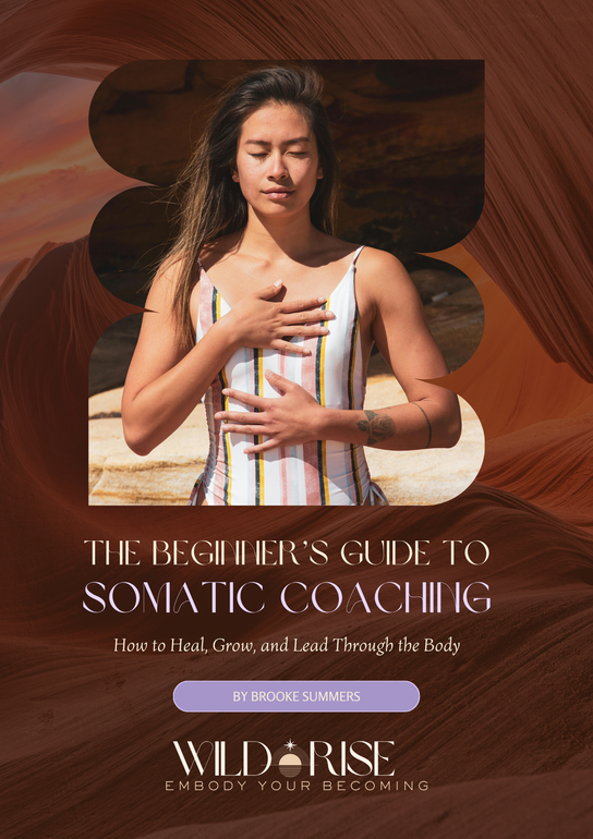 image of The Beginner's Guide to Somatic Coaching ebook. Brown, desert rocks background, woman with hands on her heart and core.
