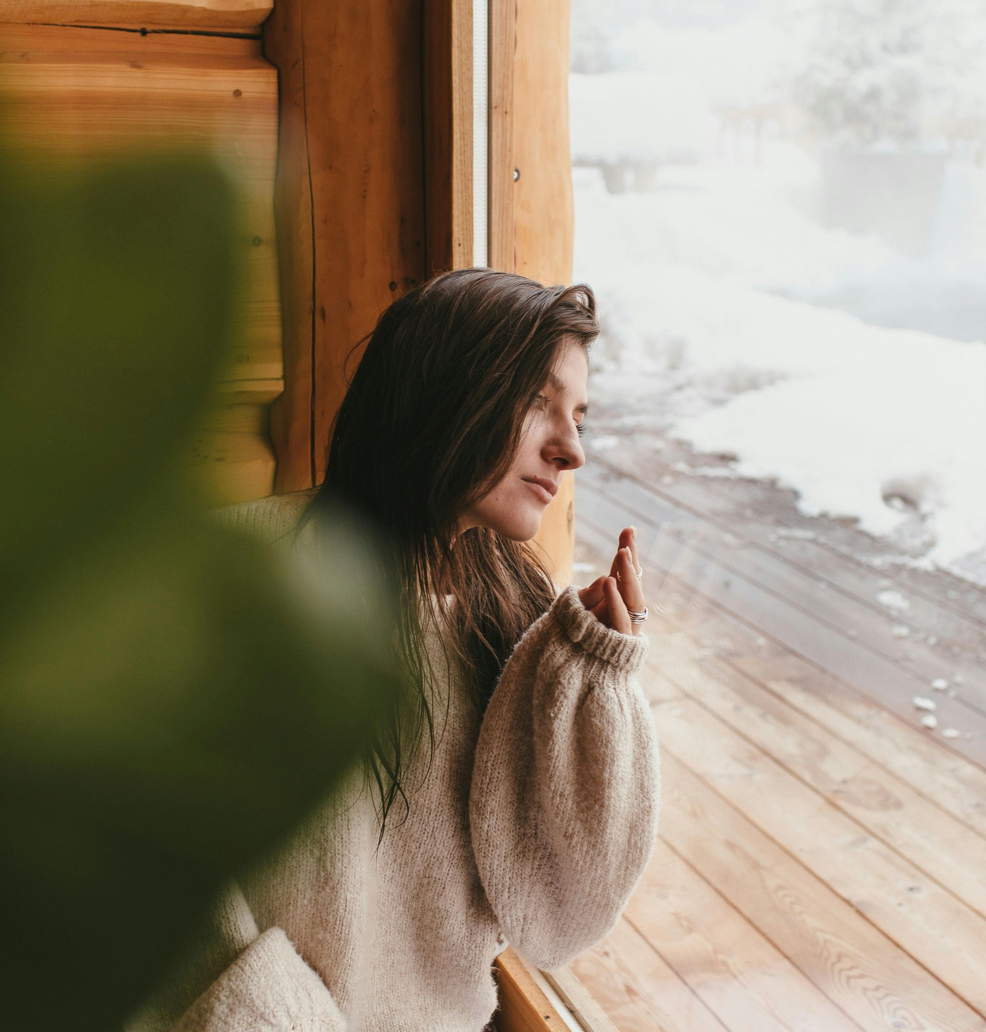 cozy bedroom with close up of bed with a warm winter blanket on it
