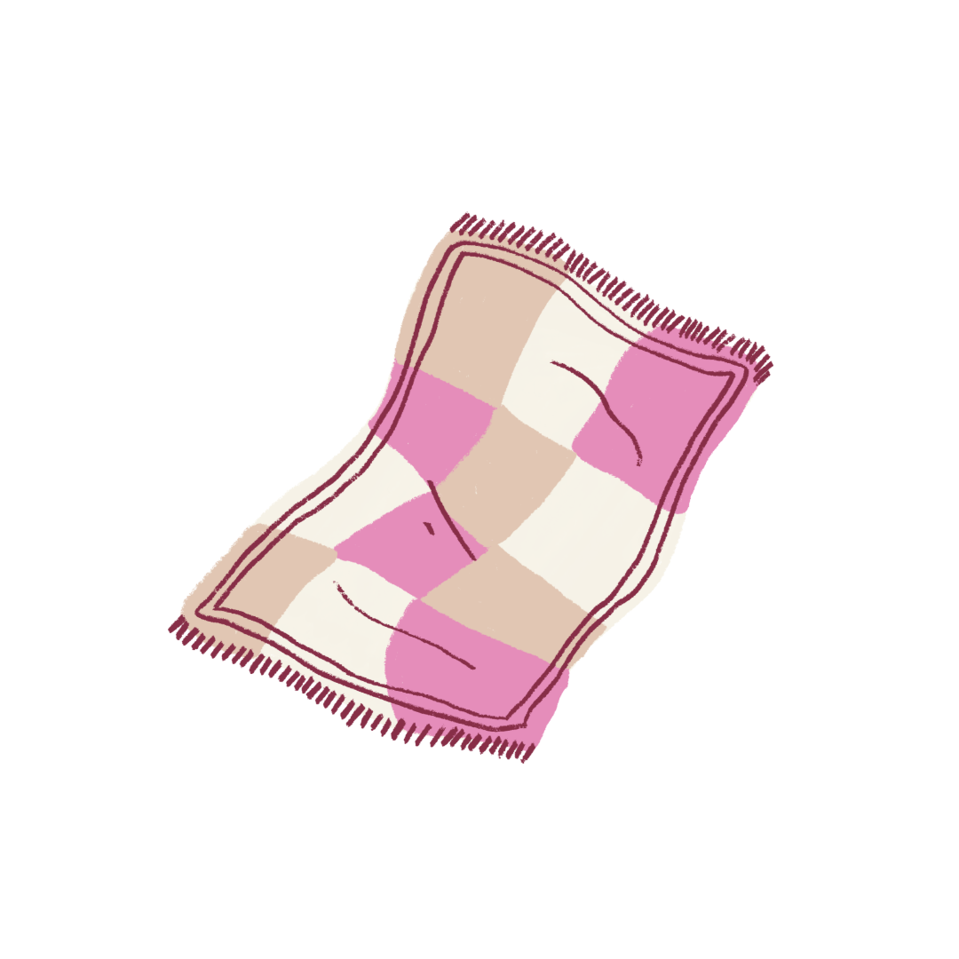 A pink and white plaid blanket with fringe on a white background