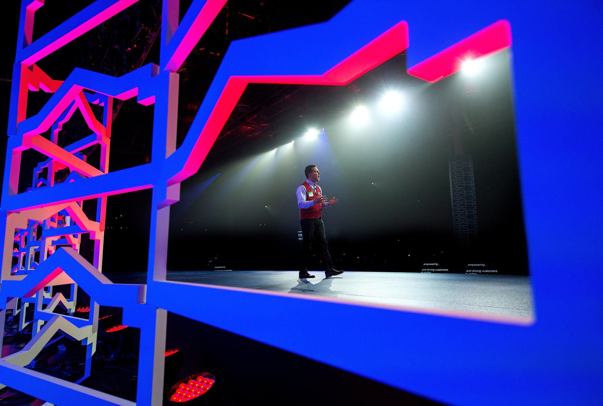 Corporate employee talking on stage