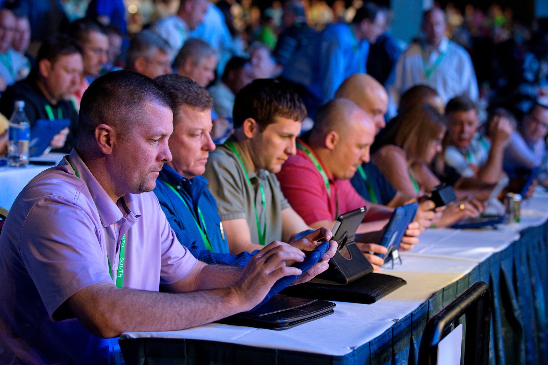 Employees at large industry meeting