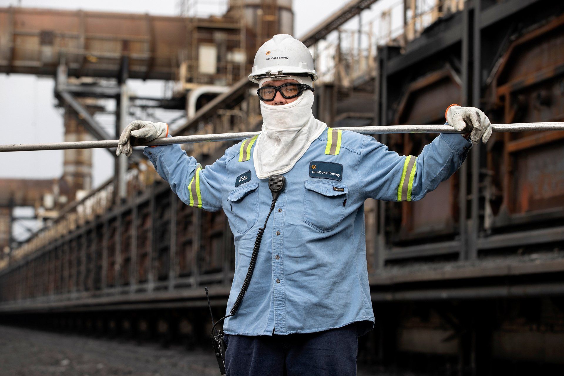 A worker at an energy company pauses to have his photo taken.
