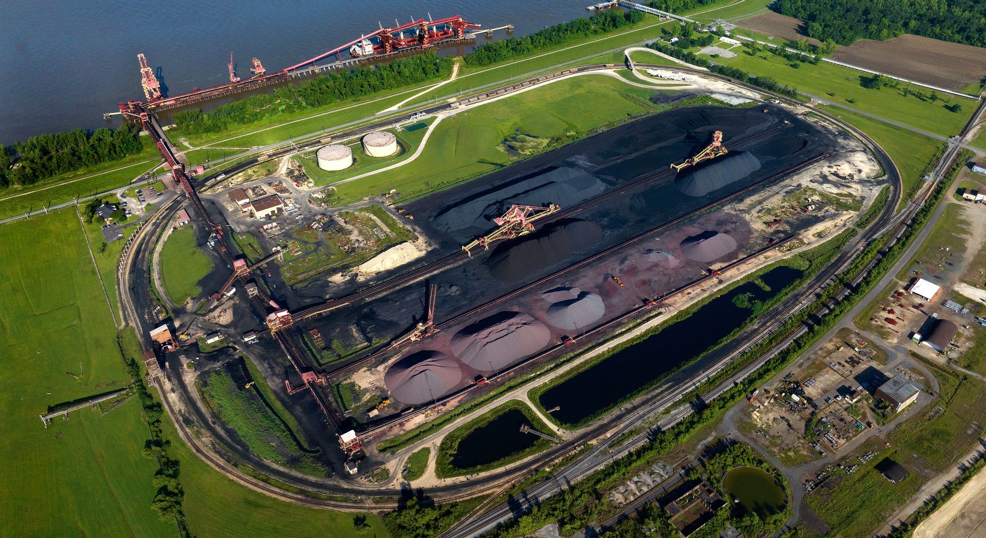 Drone photograph of coal and coke processing operations at a coal manufacturing industrial facility. 