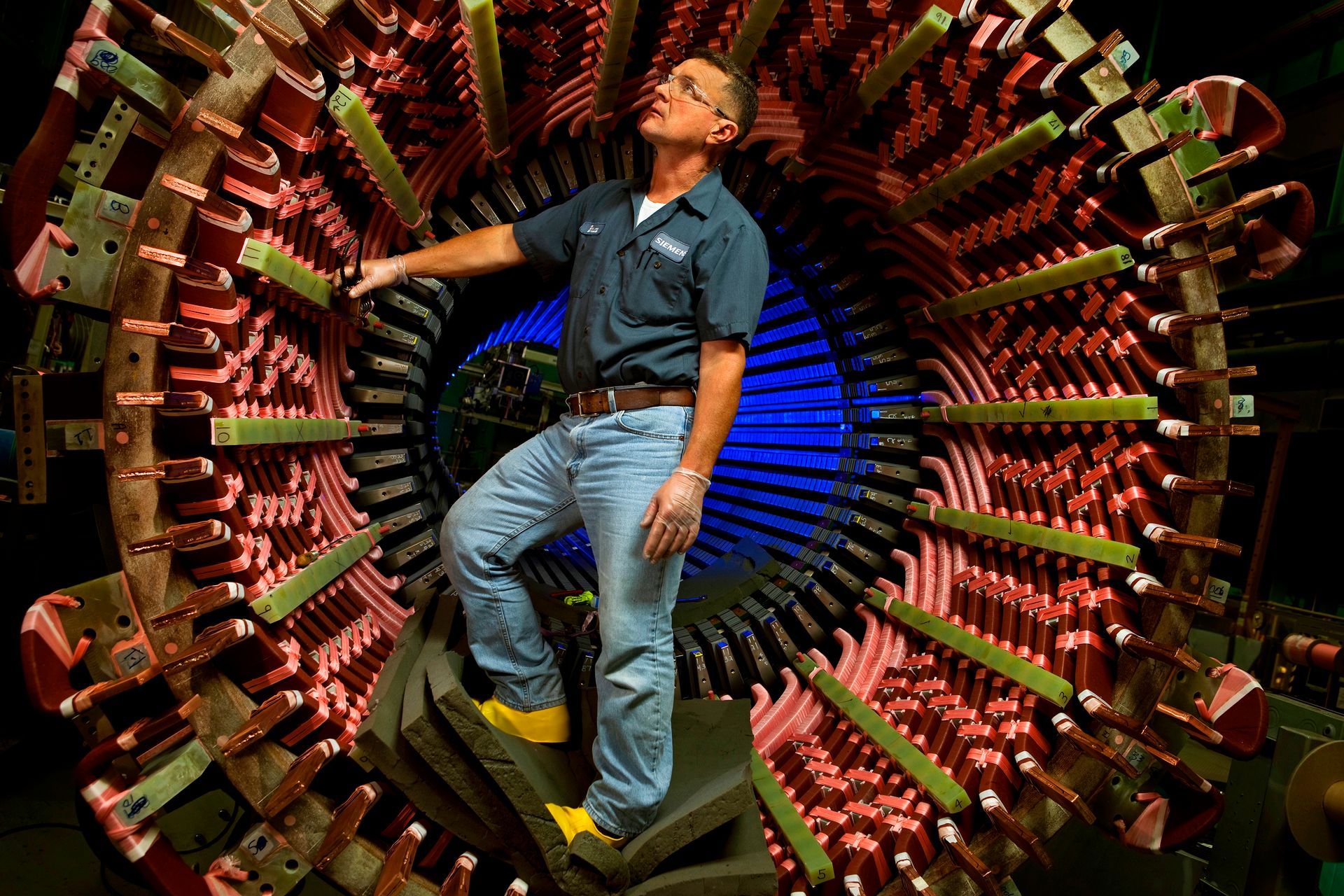 Industrial maintenance expert conducting equipment inspection.