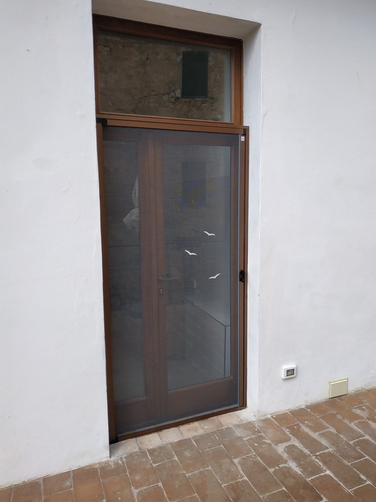 zanzariere per portoni