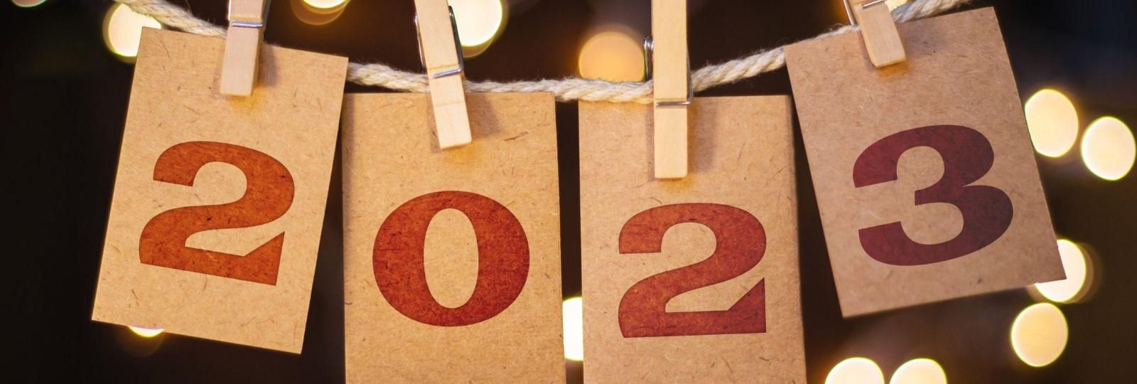 The numbers 2023 are hanging on a clothesline.