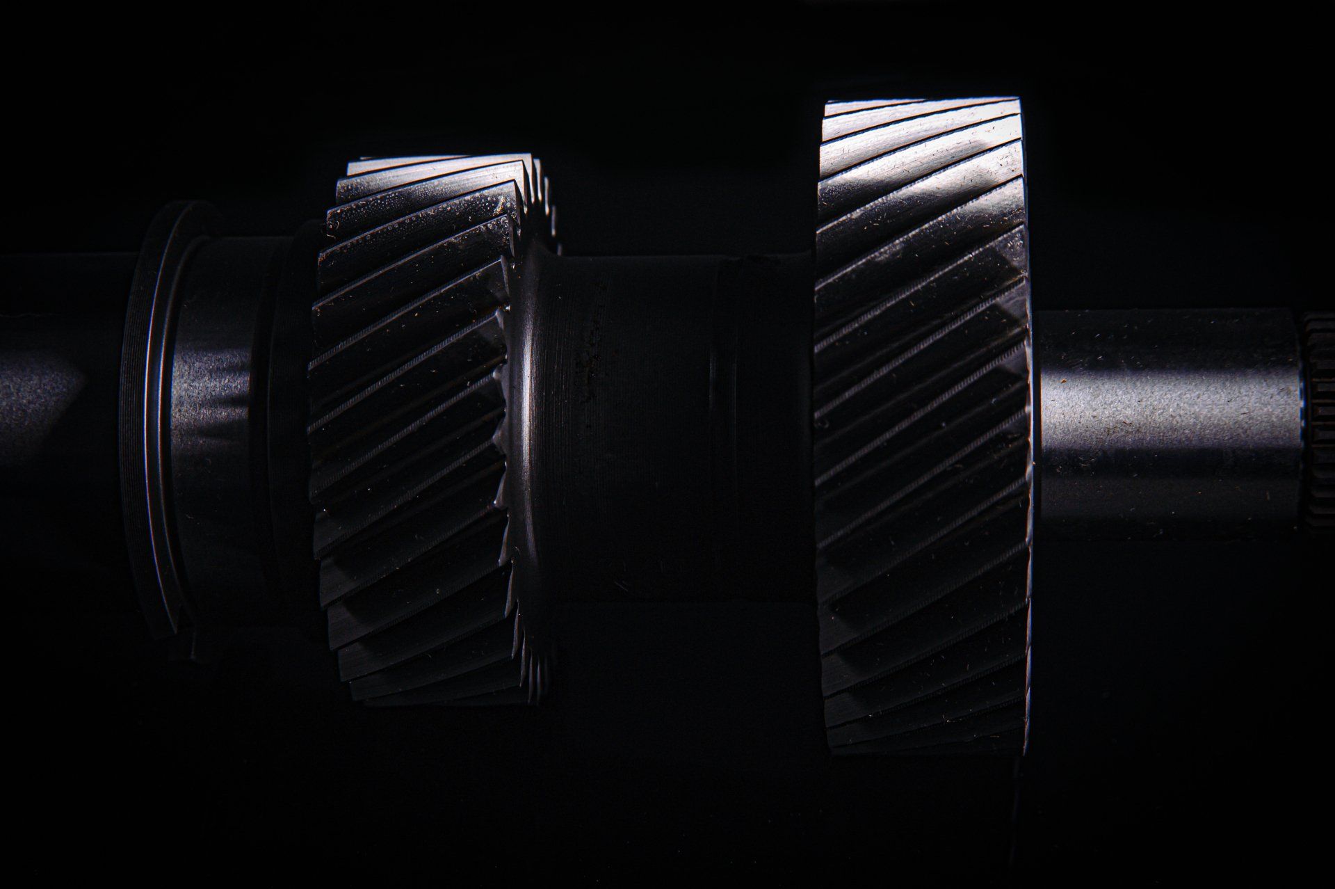 Manual gearbox repair on a black background with logo