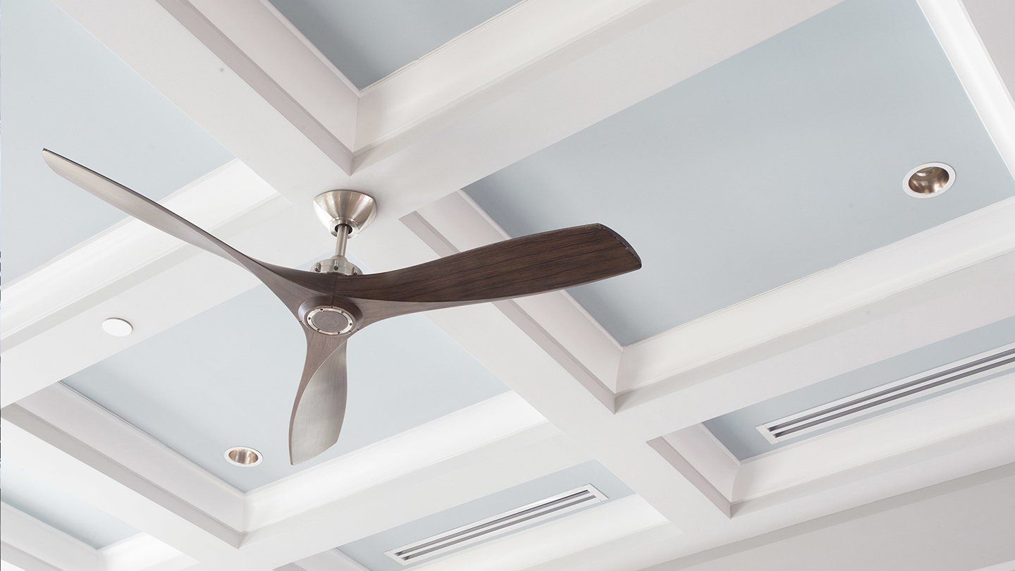 local electrician installing a ceiling fan