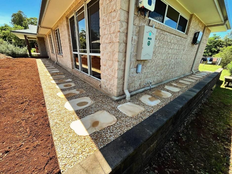 A House with A Walkway Leading to The Side of It — ZBM Constructions in Wollongbar, NSW