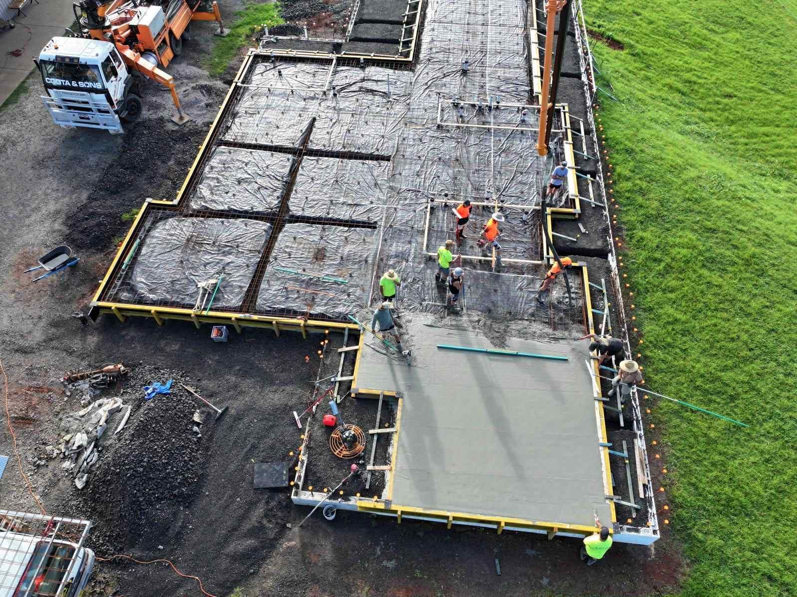 An aerial view of a construction site with workers and machinery — ZBM Constructions in Wollongbar, NSW