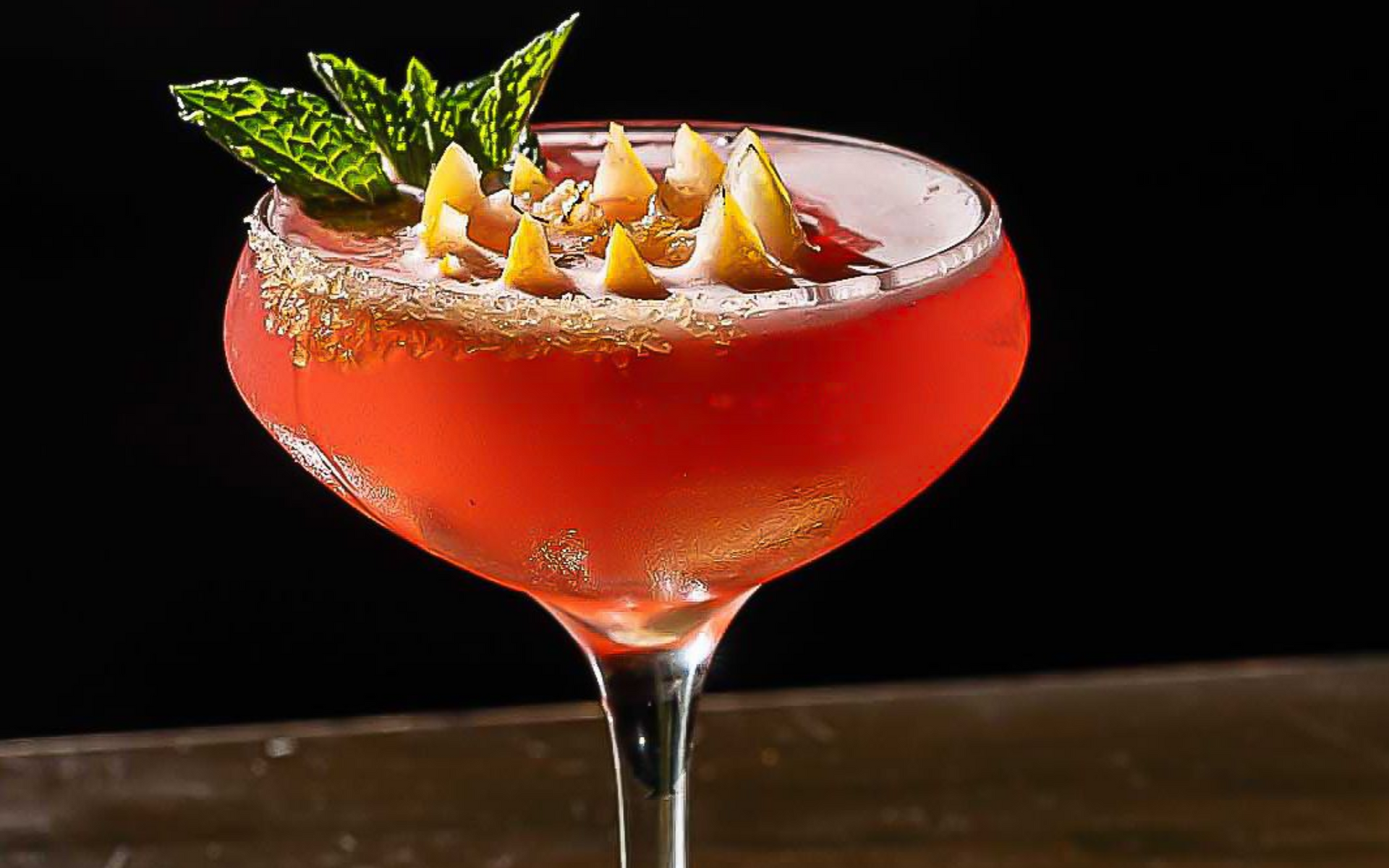 Cocktail with mint leaves and fruit