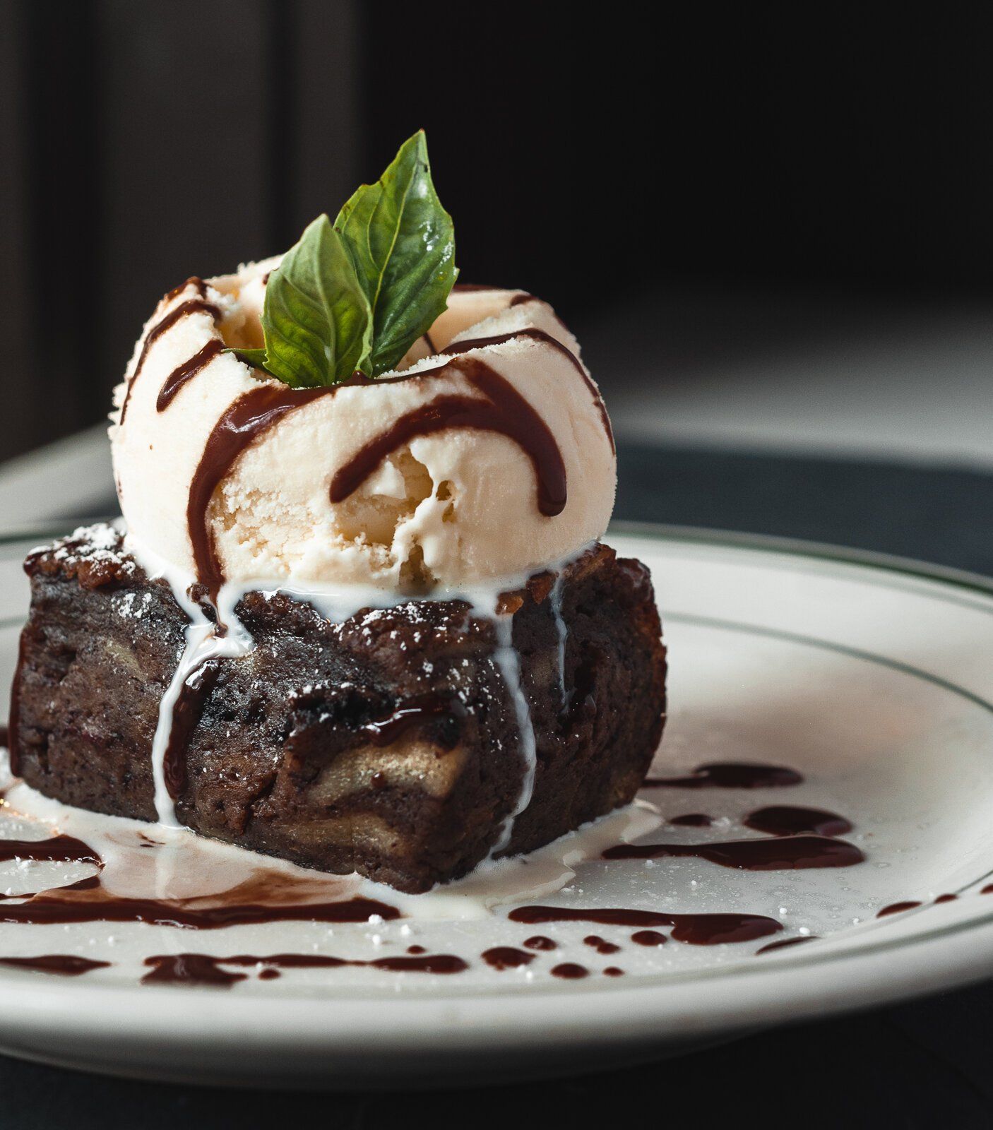 A brownie with ice cream on top