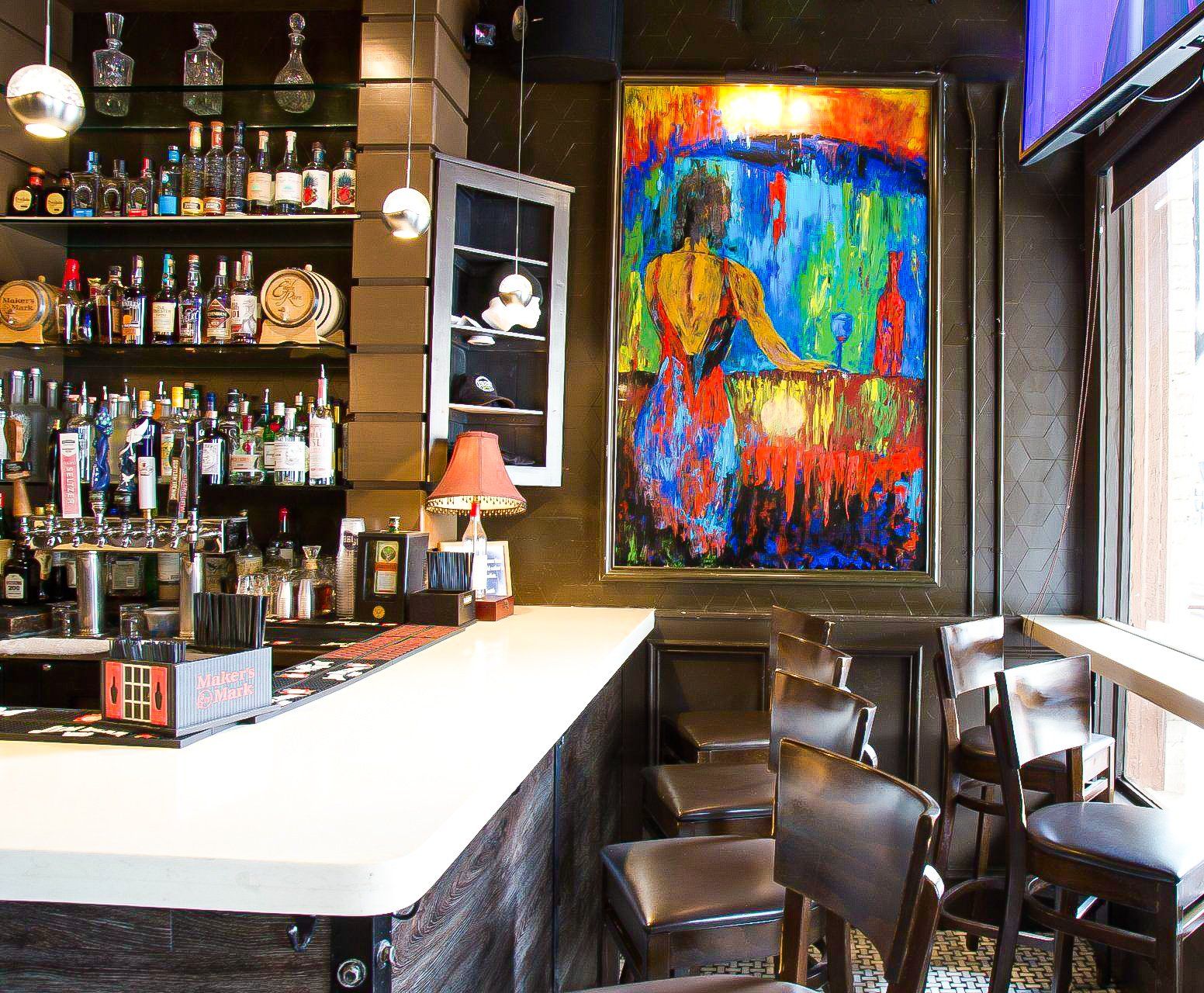 1920 Tavern bar with a painting of a woman on the wall