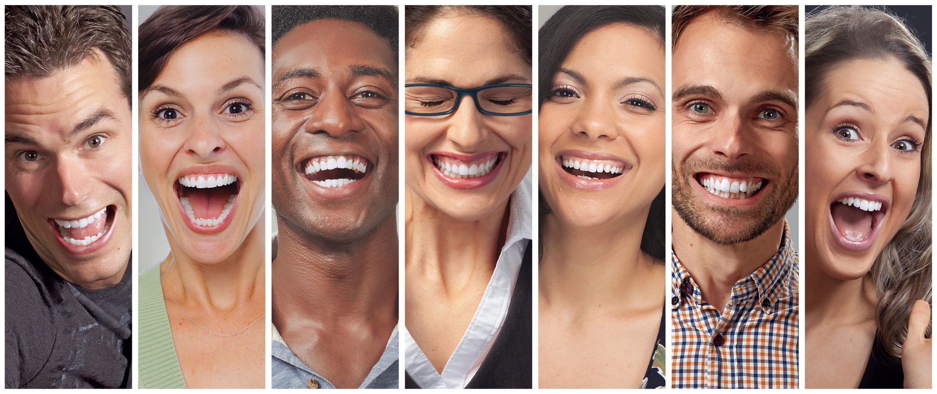 Seven people with diverse skin tones, all smiling with mouths wide open.