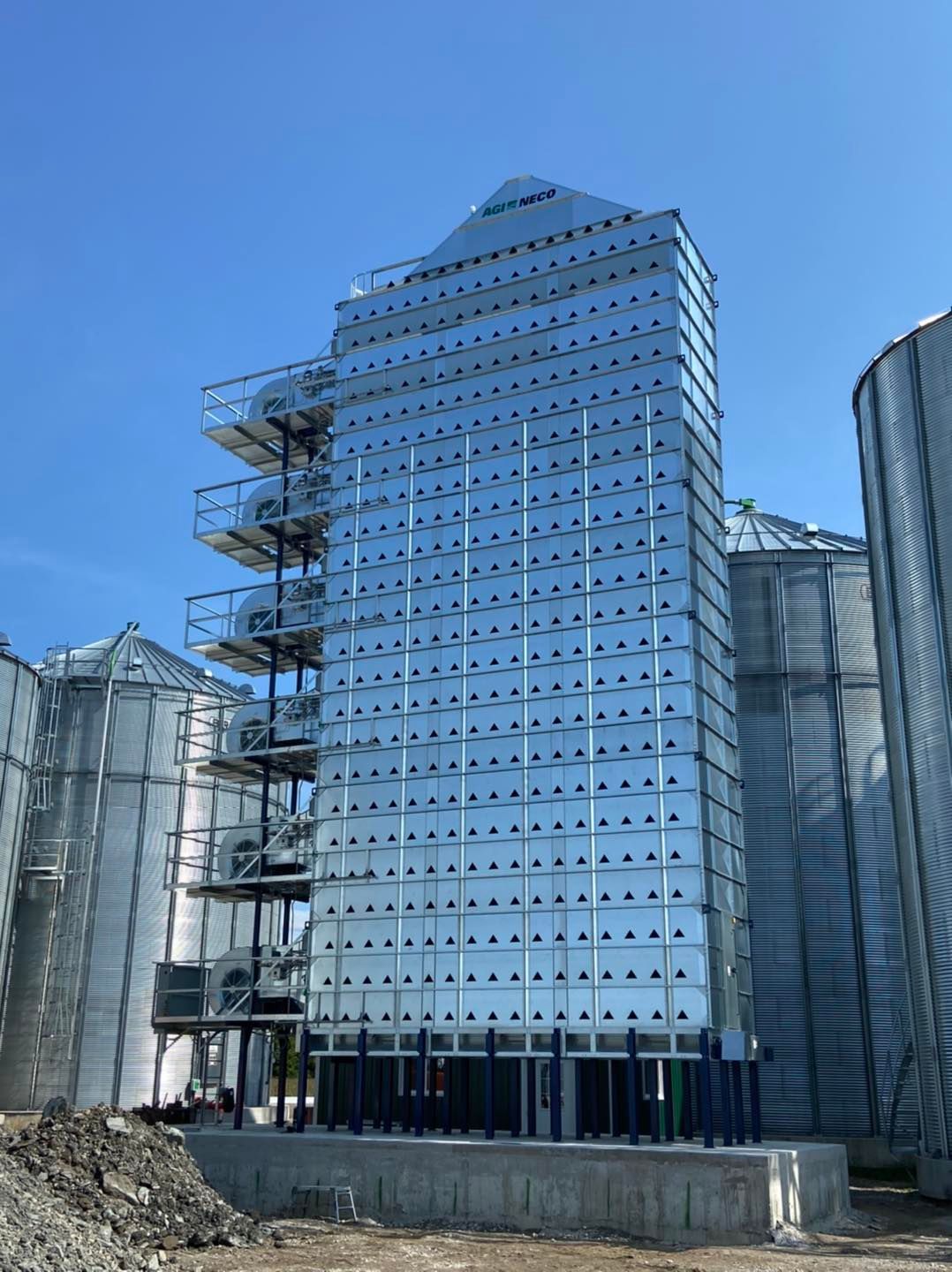 A very tall building with a lot of windows and stairs.