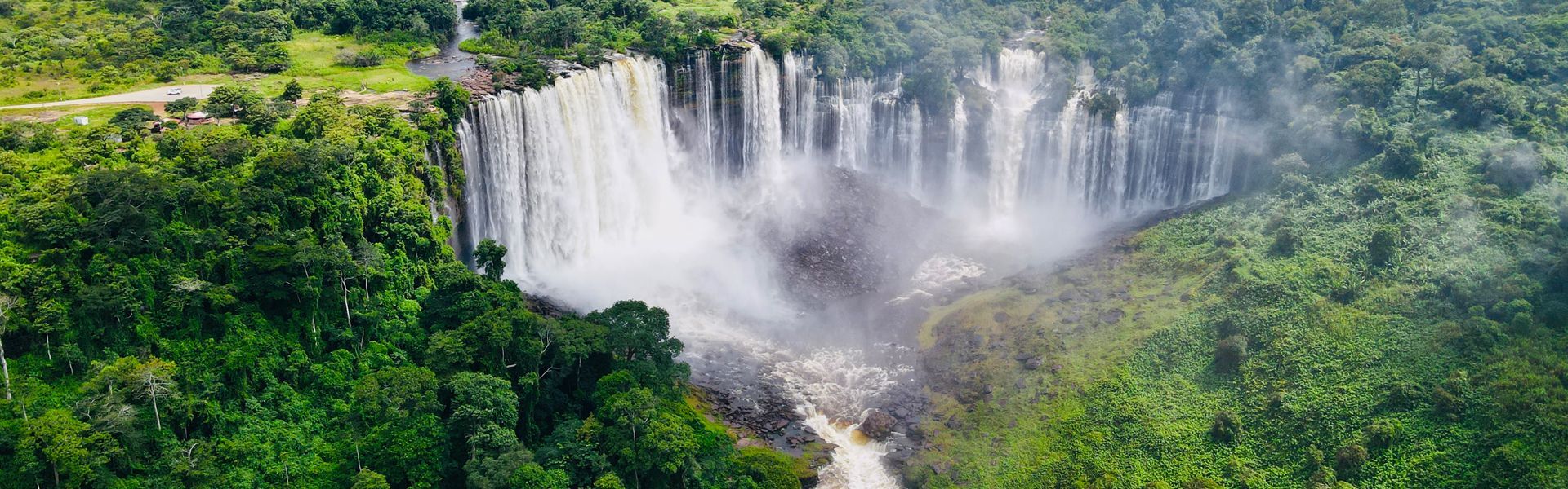Aerial view of Kalandula Falls, one of Angola’s most impressive natural sights, where powerful waters plunge into deep gorges, sending mist into the air and surrounded by lush green forest. Located in northern Angola, this remote wonder is rarely visited, offering a unique experience far from the crowds. Inspiration Africa organizes tailor-made travel to Kalandula Falls and beyond, giving you access to Angola’s untouched landscapes and hidden highlights. Whether by road or air, we design expedition-style journeys in partnership with trusted local experts to help you explore Angola’s wild beauty in comfort and safety.