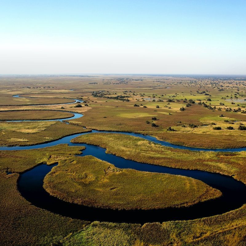 Gaze upon a breathtaking balloon flight drifting above the meandering waterways of Botswana’s Okavango Delta. This stunning aerial photograph captures winding rivers, lush floodplains, and islands bathed in soft light, revealing the intricate patterns of one of Africa’s most extraordinary ecosystems. From above, the Delta’s rich biodiversity and ever-changing landscapes come into full view. A balloon safari offers a peaceful and unforgettable perspective on this UNESCO World Heritage Site. Inspiration Africa specializes in designing bespoke, tailor-made journeys that combine unique balloon experiences with immersive wildlife encounters across Africa’s most remarkable destinations.
