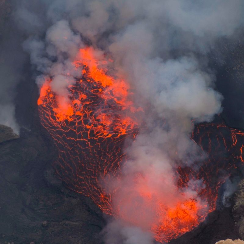 Experience the raw power and dramatic beauty of the Democratic Republic of Congo with this breathtaking aerial view of Nyiragongo Volcano. Its vast crater, surrounded by rugged volcanic terrain, captures the striking contrast between molten activity and the dark, rocky slopes that define one of Africa’s most iconic volcanoes. From above, the landscape reveals both the scale of this natural wonder and the unique ecosystems that have adapted to life in its shadow.
Inspiration Africa designs tailor-made journeys to the DRC, offering unforgettable experiences for adventurous travellers seeking to witness Nyiragongo’s awe-inspiring landscapes and explore the extraordinary wilderness of the Virunga region.