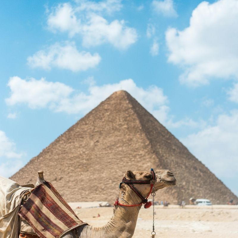 The Giza Pyramids, near Cairo, include the iconic Great Pyramid, Sphinx, and several smaller pyramids, offering a glimpse into ancient Egypt’s architectural mastery and its enduring historical legacy.