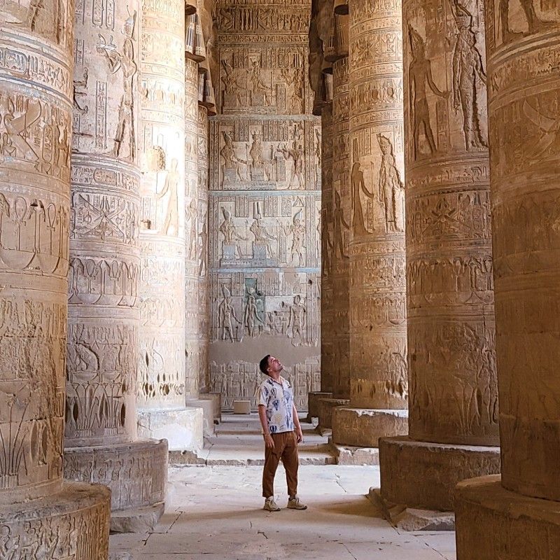 The magnificent Karnak Temple complex in Luxor, Egypt, is captured in this awe-inspiring travel photograph, showcasing one of the largest and most impressive religious sites ever built. Towering columns, intricately carved hieroglyphs, and grand stone avenues reflect the power and devotion of ancient Egyptian civilization over thousands of years. Located along the Nile, Karnak served as a spiritual center dedicated primarily to the god Amun and remains a UNESCO World Heritage Site. Ideal for history lovers, culture enthusiasts, and photographers, Karnak offers an unforgettable journey through ancient architecture and sacred history. Inspiration Africa specializes in bespoke, tailor-made journeys to Egypt and across Africa, crafting authentic travel experiences that bring legendary monuments and timeless cultural heritage to life.