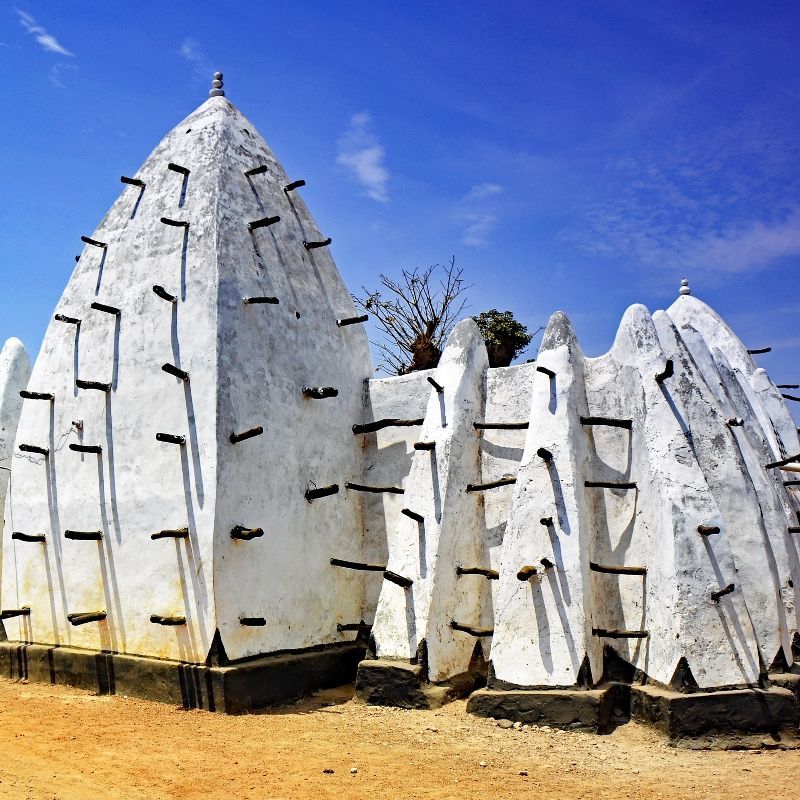 The Larabanga Mosque in northern Ghana, one of the oldest mosques in West Africa and a fine example of Sudano-Sahelian architecture. With its whitewashed walls and timber-frame structure, it stands as a symbol of deep cultural and spiritual heritage. Inspiration Africa offers tailor-made travel experiences to Ghana, including visits to historic landmarks like Larabanga. Whether part of a broader cultural journey or a focused heritage tour, Inspiration Africa ensures every itinerary is crafted to connect you with the history, people, and landscapes that make Ghana truly memorable.