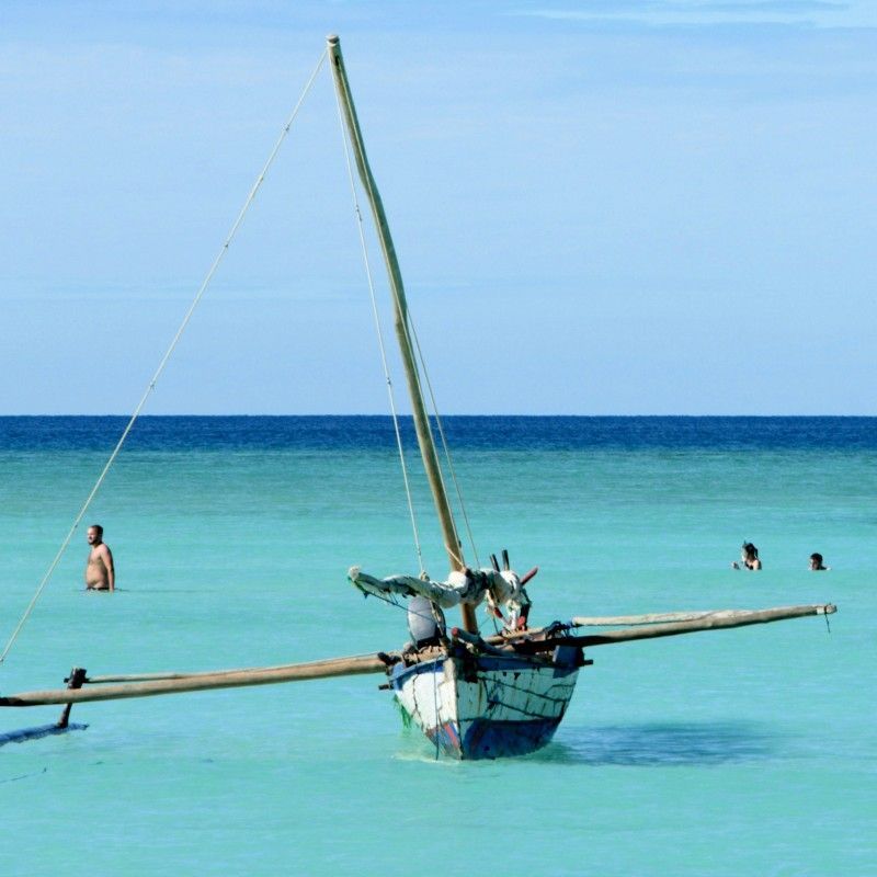 Experience the postcard-perfect beauty of Nosy Iranja, Madagascar. This idyllic photo features a traditional boat resting gracefully in the lovely, clear turquoise waters of this stunning island paradise. The scene perfectly captures the tranquility and maritime heritage of Madagascar's coast. Inspiration Africa specializes in designing your ultimate, tailor-made trip to Nosy Iranja and many other unforgettable destinations across Africa. Plan your dream island holiday with us today!