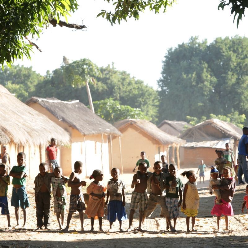 In Madagascar’s rural villages, children greet visitors with warm smiles, playing along dusty paths as daily life unfolds—colorful markets, traditional homes, and community spirit reflecting the island’s rich culture and hospitality.
